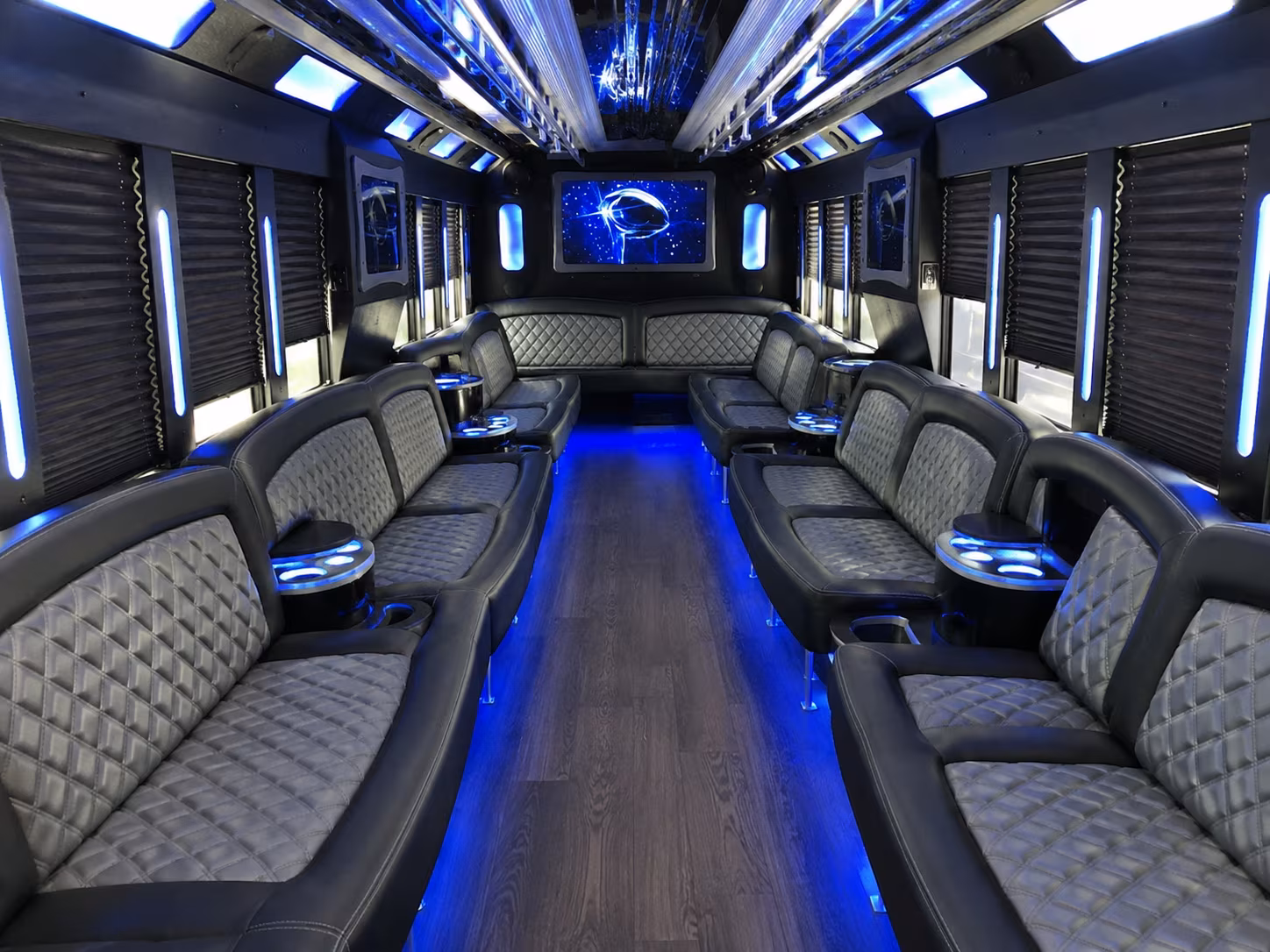 Friends laughing during a party bus celebration in Long Beach